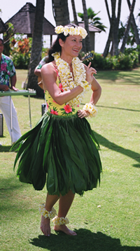 photo of Kanoe Miller in ti leaf skirt